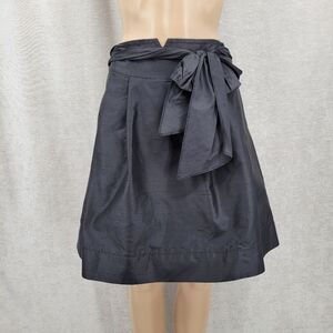 Trina Turk Silk Crepe Black A-Line Pleated Midi Skirt Bow Ties Waist Pockets